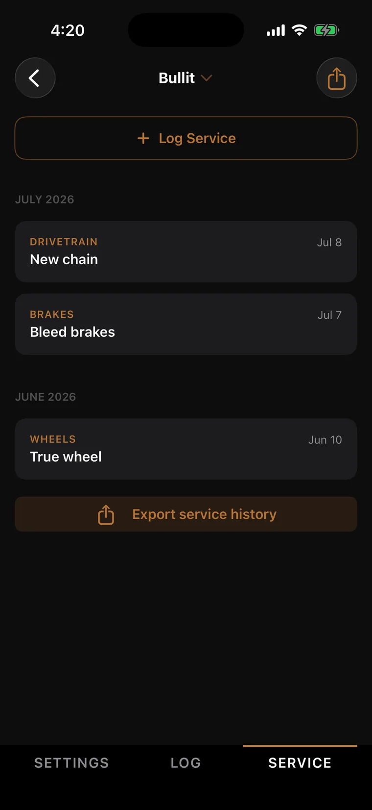 Bike service history in Tune Pro with drivetrain, brake, and wheel entries grouped by month